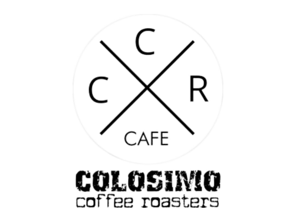 Colosimo Coffee Roasters Café logo. A large circle with an x through it. In each of the four spaces around the X are “C,” C,” “R,” “Cafe”. Tets at the bottom reads, “Colosimo Coffee Roasters”. 