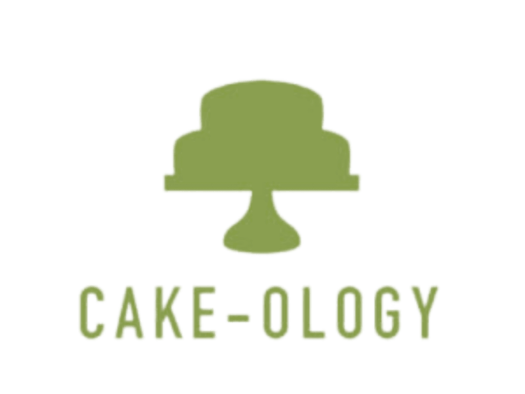 Cake-ology logo. A silhouette of a two-tiered cake on a cake stand with “Cake-ology” underneath. 