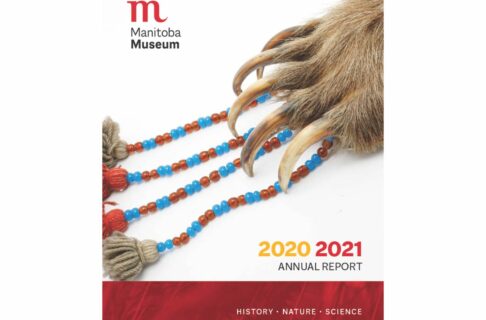Report Cover: A close up photo of a museum artifact. A large paw with five long claws stretch over four beaded tassels. In the upper left corner is the Manitoba Museum logo. In the lower right, text reads, “2020-2021 Annual Report / History – Nature – Science".