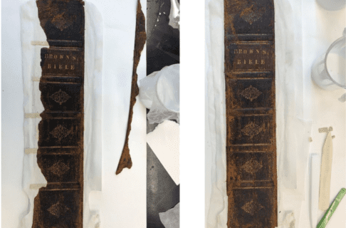Two photos side-by-side. On the left, looking down on the spine of the Brown’s Bible with a torn section along the left side. The torn off section is lying beside the rest of the spine. On the right, the repaired spine in one piece.