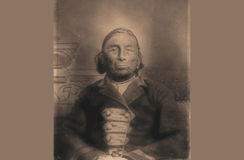 Sephia-toned studio photograph of Chief Gaagige Binesi, Forever Thunderbird, also known as William Mann Sr.