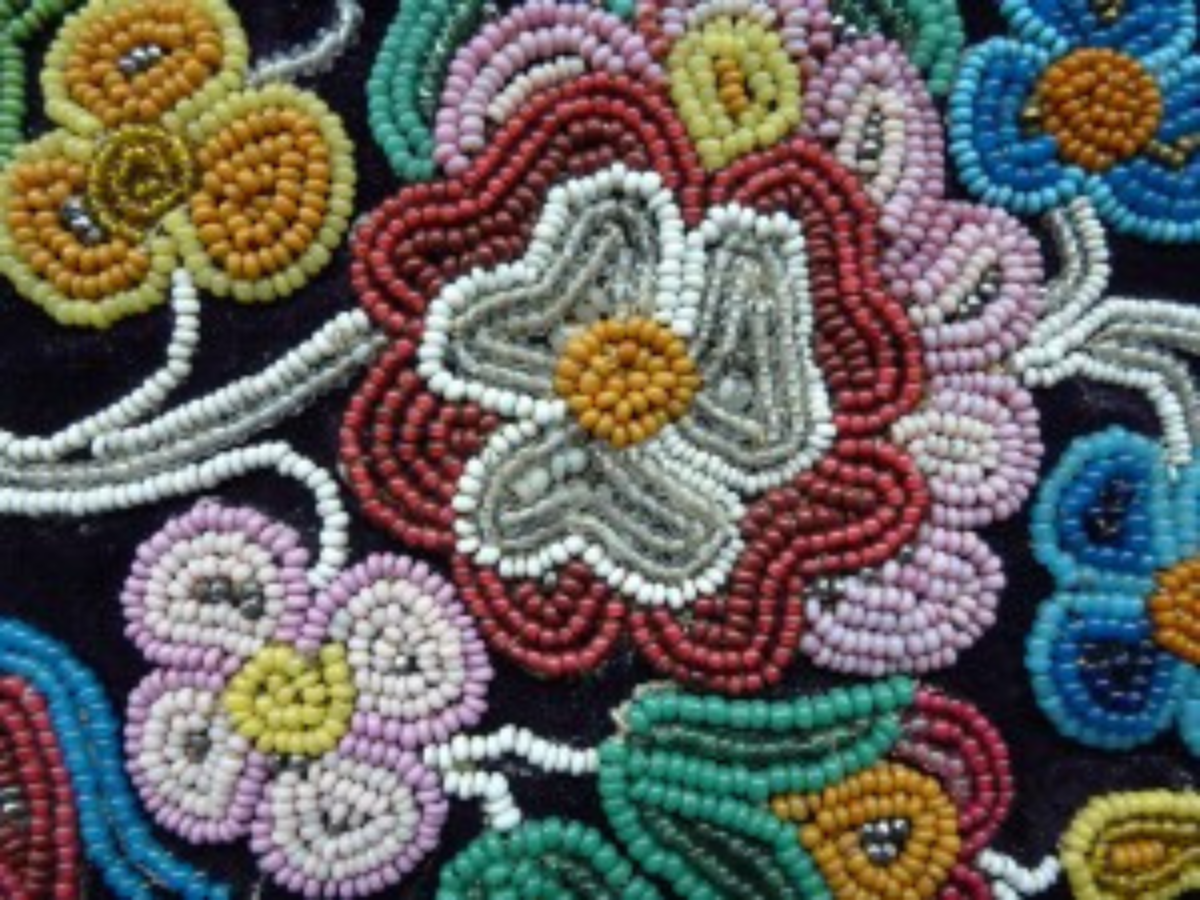 Close-up of colourful, floral beaded panel