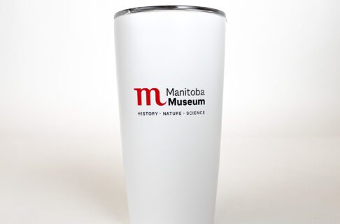 A white drinking tumbler with the Manitoba Museum logo.