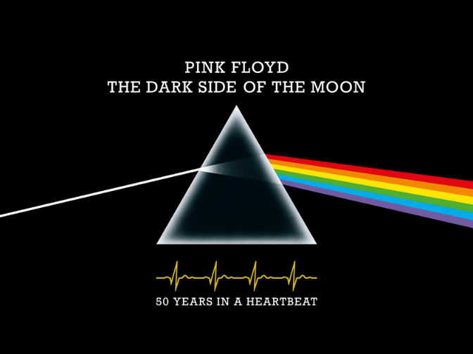 At the top, the iconic Pink Floyd triangle logo with the number 50 inlaid. In the centre of the 0 is a rainbow. Directly above the logo text reads, “Pink Floyd / The Dark Side of the Moon”. Below the prism is a heartbeat line and “50 years in a heartbeat”.