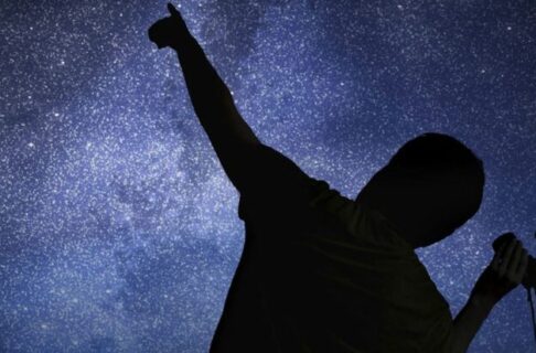 A family looking at the stars.