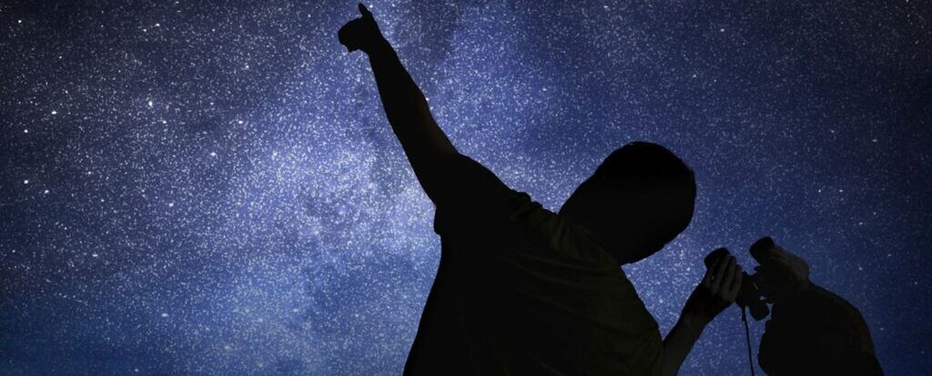 A family looking at the stars.