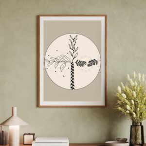 A framed art pint hanging on a wall. It features four branches and braids in a cross shape across the canvas.