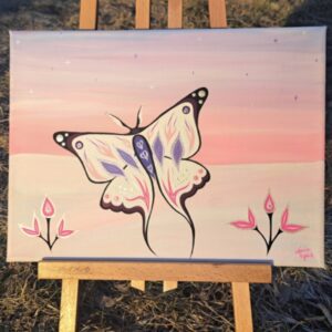 A painting of a butterfly and flowers in pastel pinks and purples and white on an easel.