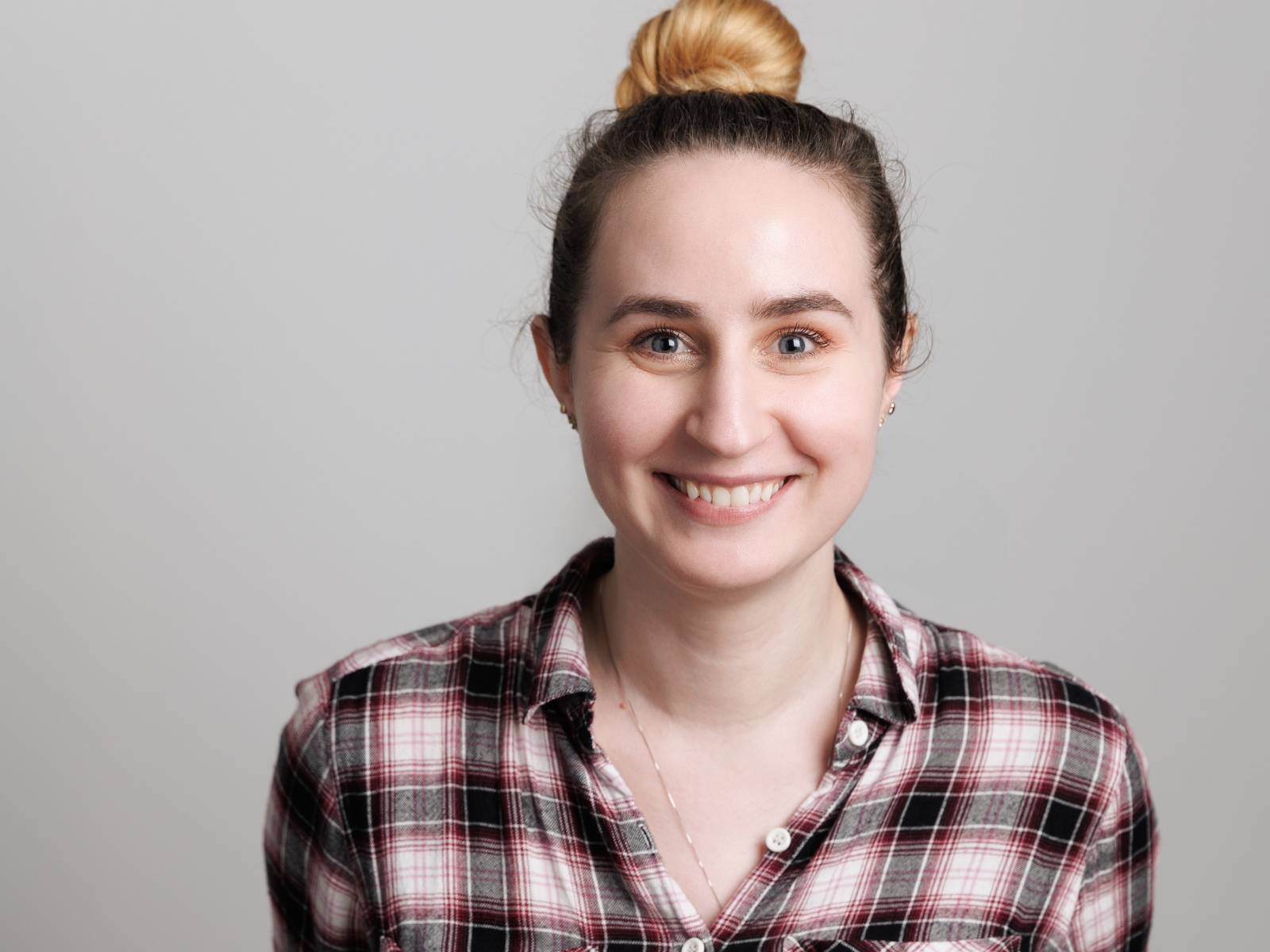 Formal headshot of Estelle Girard smiling at the camera.