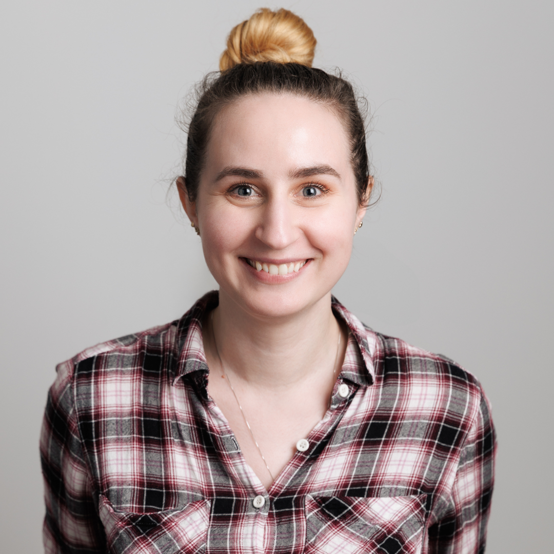 Formal headshot of Estelle Girard smiling at the camera.