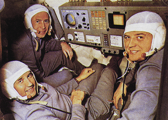 Photo of the three man crew of Soyuz 11 in the cockpit.