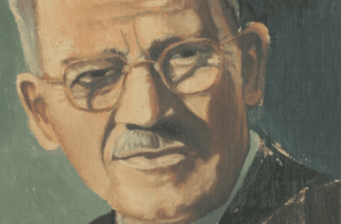 Close-up on the face in an oil-portrait of an older man with glasses and a moustache