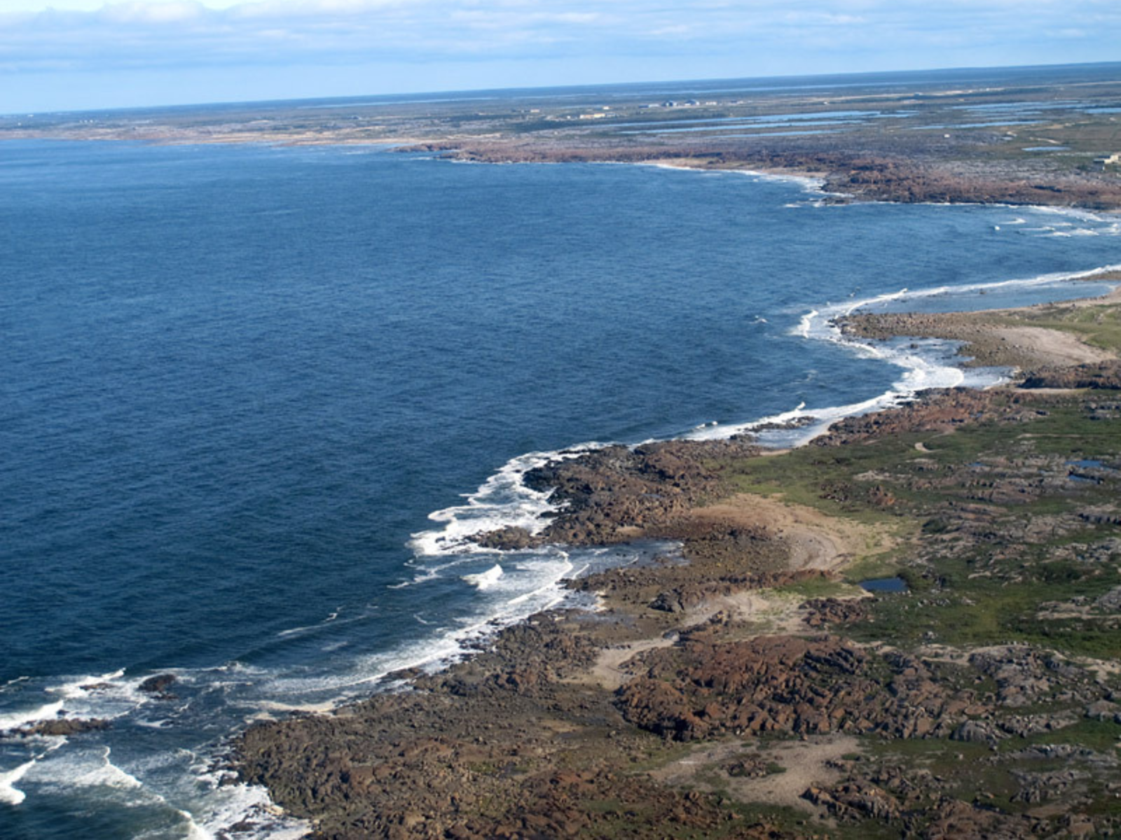 Aerial view along the rugged coast of the Hudson Bay.