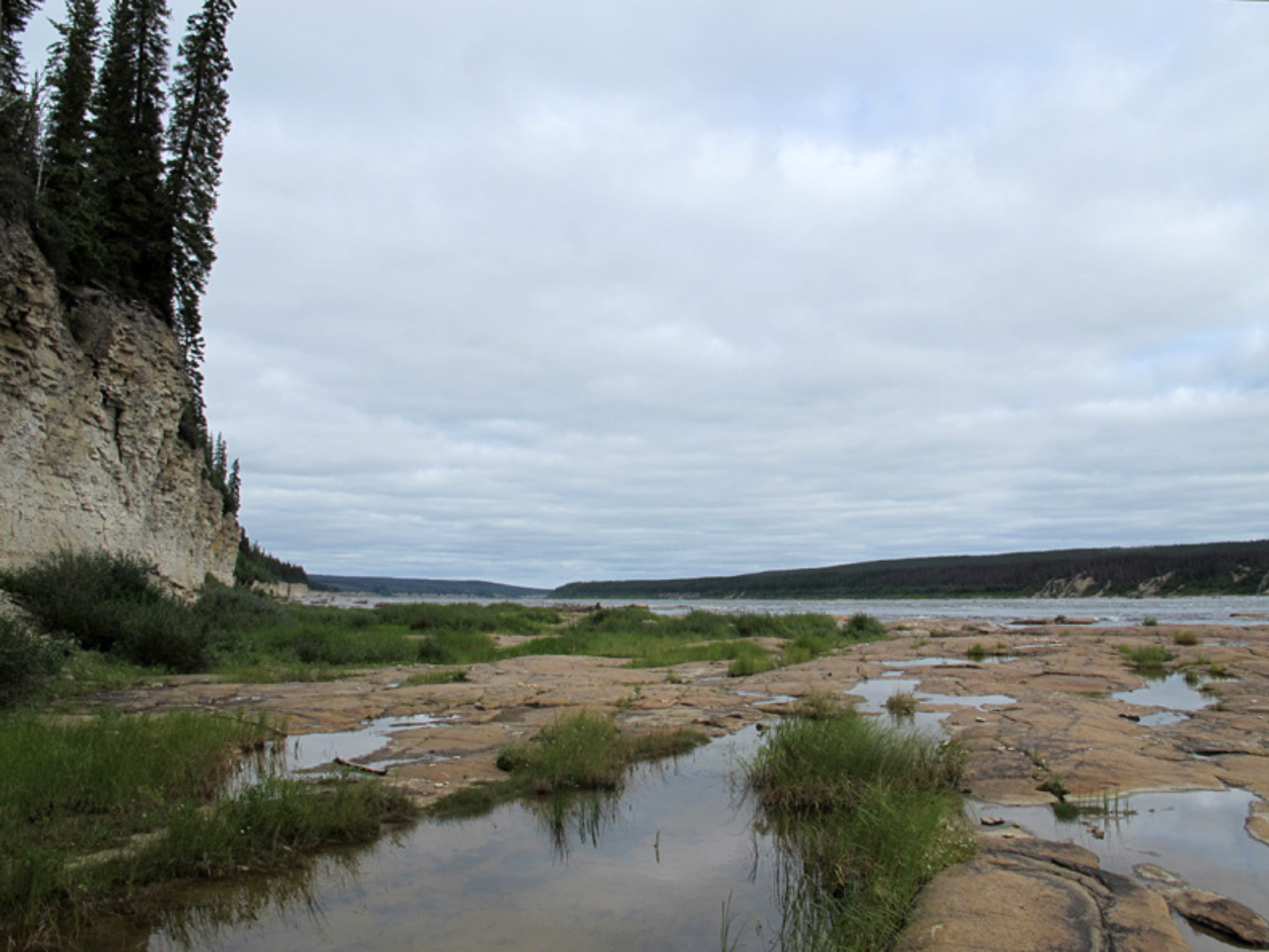 A rocky, cliff side river bed.