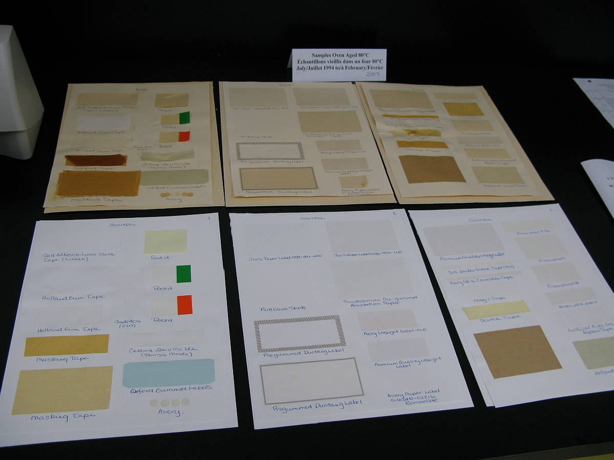 Six sheets of paper, the top three darkens to cream, and the bottom three white. All have various tape samples on them.