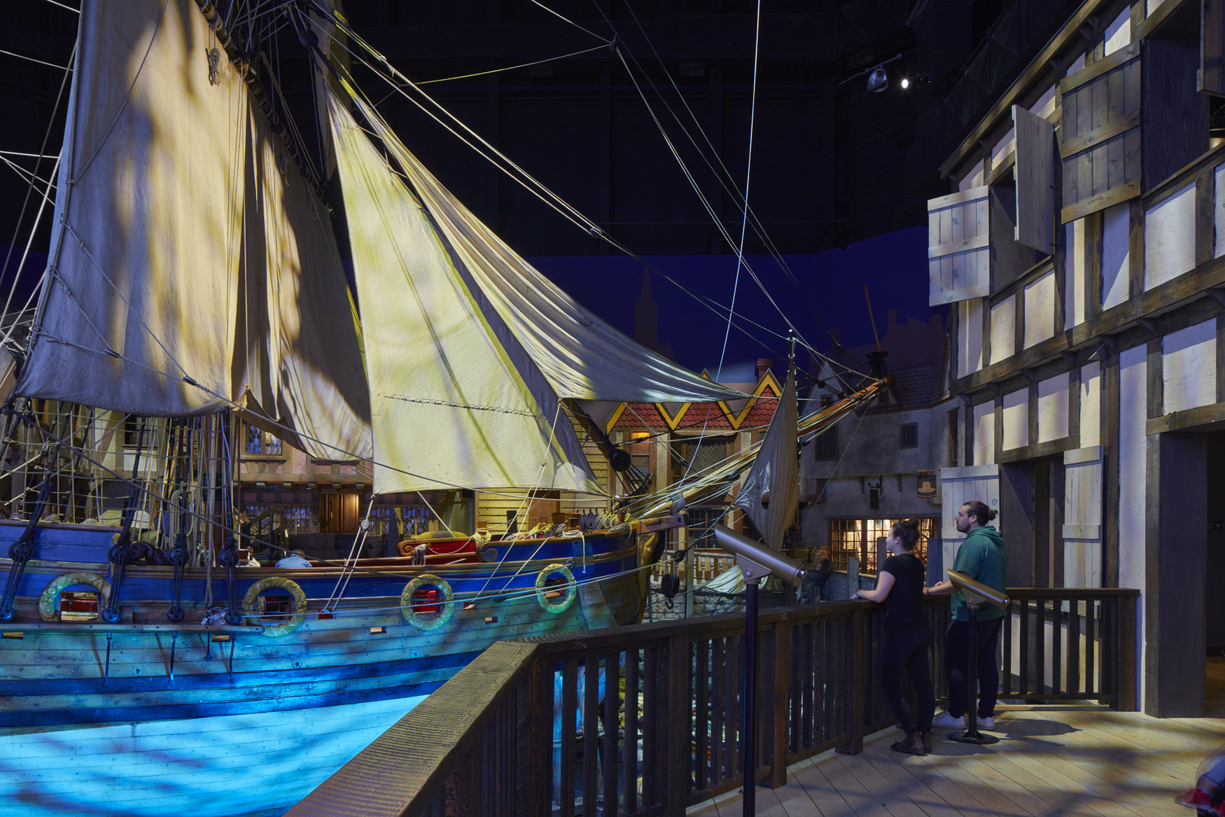 Image of the ship with light shining on the sail.