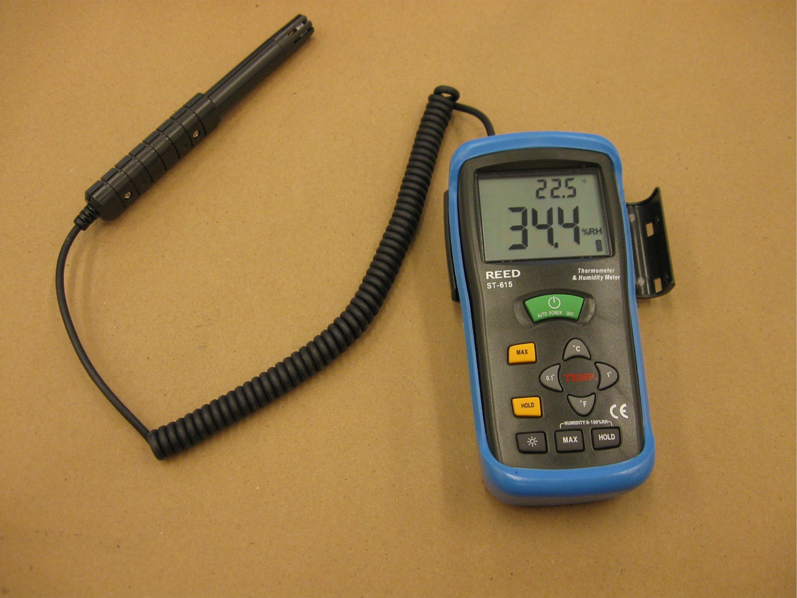 A thermohygrometer attached to a sensor on a coil.