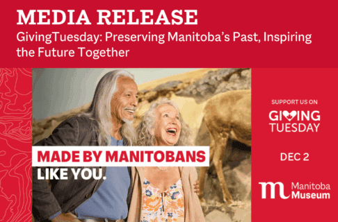 A photograph of two adults smiling and laughing together near the caribou diorama in the Arctic & Sub-Arctic Gallery of the Manitoba Museum. Text on the image reads, "Made By Manitobans Like You". On a red bar to the right, above the Manitoba Museum logo, text reads, "Support us on GivingTuesday / Dec. 2". Above the image, on a slightly darker red bar, text reads, "Media Release / GivingTuesday: Preserving Manitoba’s Past, Inspiring the Future Together".