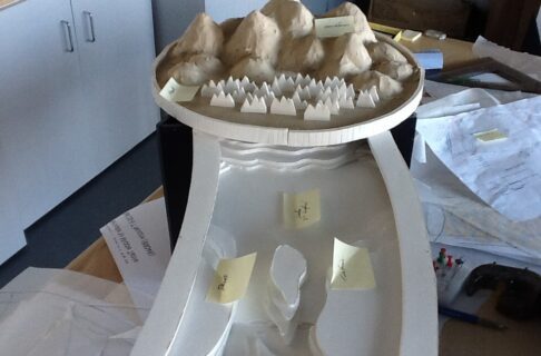 A concept model of a watershed table, where water will flow from the mountains on top down towards the camera.