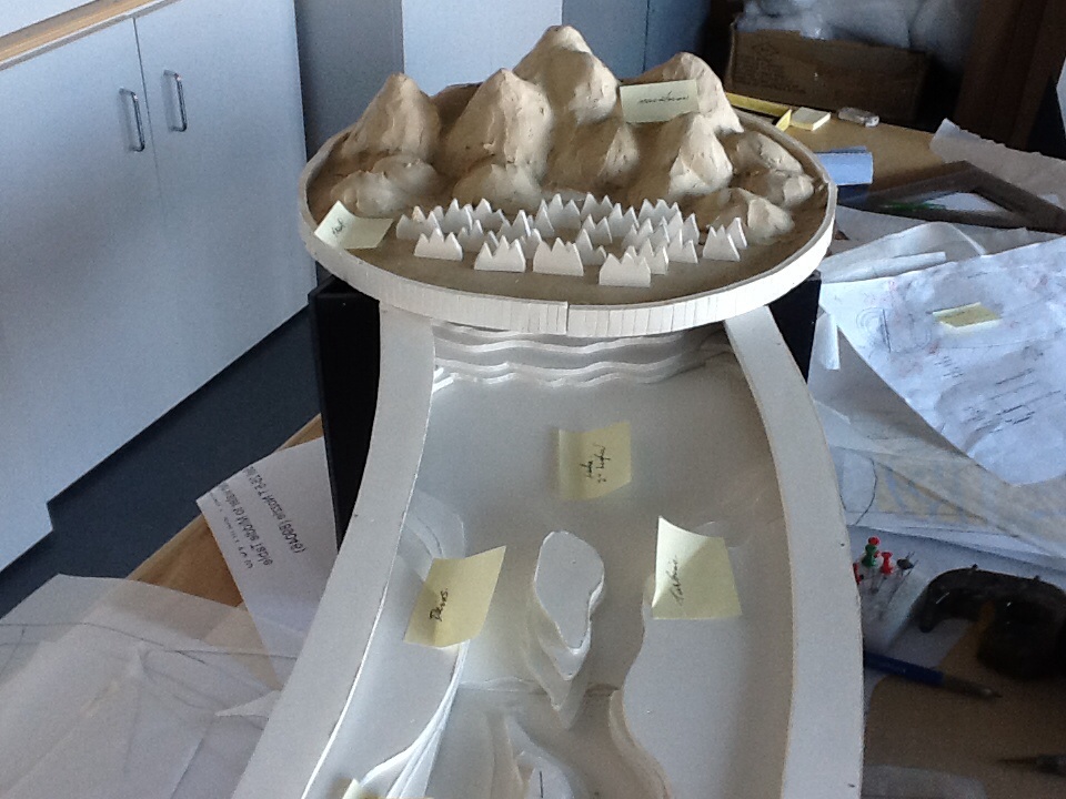 A concept model of a watershed table, where water will flow from the mountains on top down towards the camera.